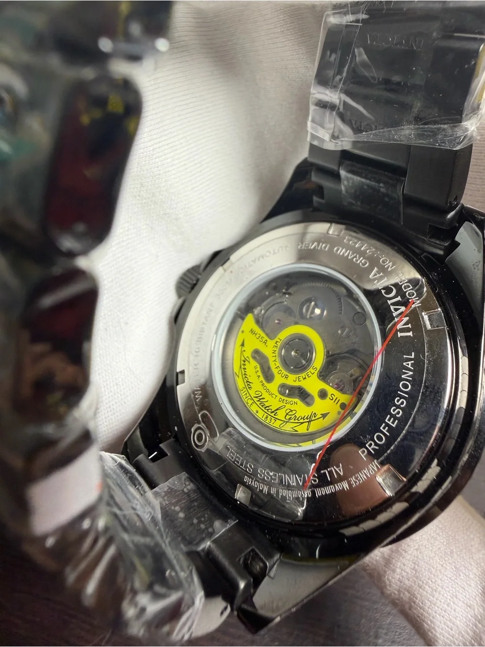 Invicta Orange Dial Dive Watch with Patterned Strap
